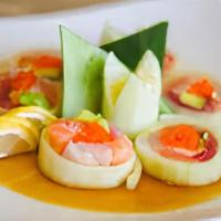 Naruto · Tuna, salmon, yellowtail and avocado wrapped with cucumber served with ponzu sauce.