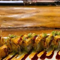 Mummy Roll · Inside; shrimp tempura, spicy kani, avocado, mango outside; spicy shrimp, scallion, masago, ...