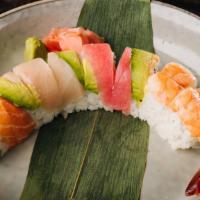 Rainbow Roll · Inside; crabmeat, avocado, cucumber outside; tuna, salmon, yellowtail, shrimp & avocado.