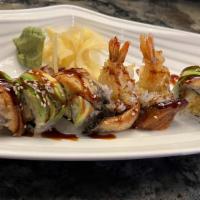 Black Dragon Roll · Inside; shrimp tempura, cucumber outside; eel & avocado & eel sauce.