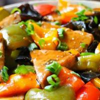 Fried Bean Curd Home Style · Fried tofu w. Scallions, zucchini, sweet peas, & green & red pepper - vegetarian.