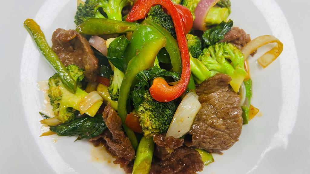 Basil Beef · Basil leaf, onions, broccoli, asparagus, scallions, green & red bell peppers in chef’s special sauce - hot.