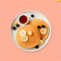Wild Pancakes · 3 pcs fluffy pancakes cooked with care and love served with blueberry, strawberry and banana...