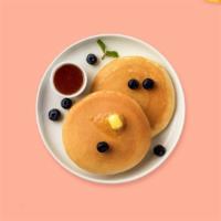 Berry Nut Pancakes · 3 pcs fluffy pancakes cooked with care and love served with blueberry, almonds, butter and m...