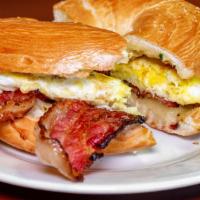 Breakfast Sandwich/Wrap · Bacon, egg, cheese, green peppers, onions, tomatoes, bacon, ham.