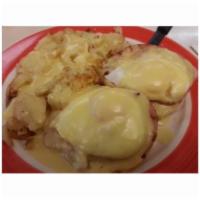 Eggs Benedict · Two Poached Eggs, Served Over an English Muffin, with Canadian Bacon, Topped with Hollandais...