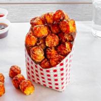 Sweet Potato Tots · Topped with cinnamon sugar.