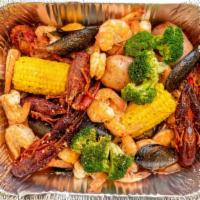 Combo Boils · Shrimp Head Off 1 lb, Crawfish 1/2 lb, Black Mussel 1/2 lb with corn & potatoes (Don't forge...
