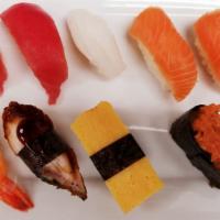 Nigiri Bento B (9 Pieces) With High Quality Rice(Tamaki) · 2 Fresh Ahi, 2 Fresh Salmon, Ika, 
Ebi, Unagi, Egg, Spicy Ahi