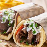 Lamb Gyro With Fries · Succulent lamb, lettuce, tomatoes, onions, cucumbers, and white sauce. Served with fries.