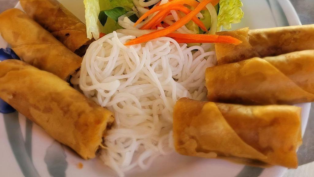 Vegan Spring Rolls · Deep-fried flour rolled ground pork, taro, carrots, shallots, and garlic. Served with fresh mint, cucumber, and lettuce, vermicelli thin noodles, and house nuoc mam dipping sauce.