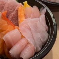 Chirashi · 15 pieces of assorted fish over seasoned rice.