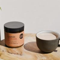 Moon Juice Cocoa Latte · Mood Booster. Hot chocolate, plant-based milk (oat, almond, coconut), moon juice cosmic coco...