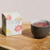 The Qi Rose Tea · Gut Booster. Hot water, the Qi Shangri-la rose tea, The Beauty Chef Gut Primer.