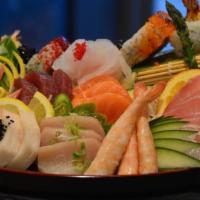 Sushi & Sashimi Combo · Six pieces sushi, 10 pieces sashimi, six pieces California roll. Raw or uncooked.