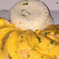 Pollo Relleno · Chicken breast, stuffed with ham, sweet plantains, and cream cheese.