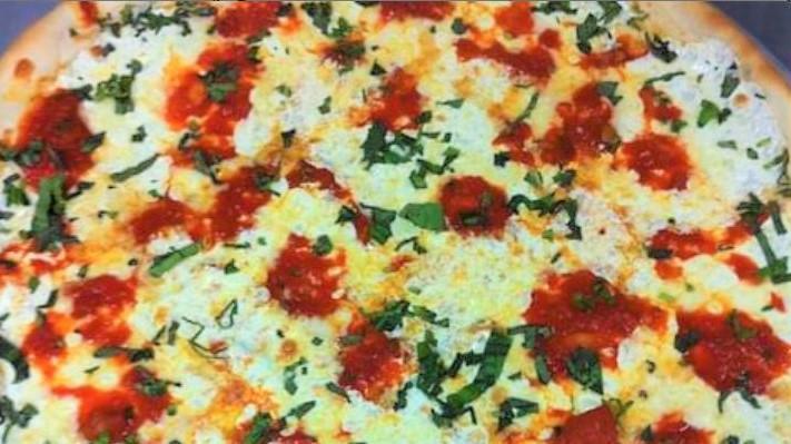 Margherita Pizza (12”) · Fresh mozzarella, marinara sauce, and fresh basil.