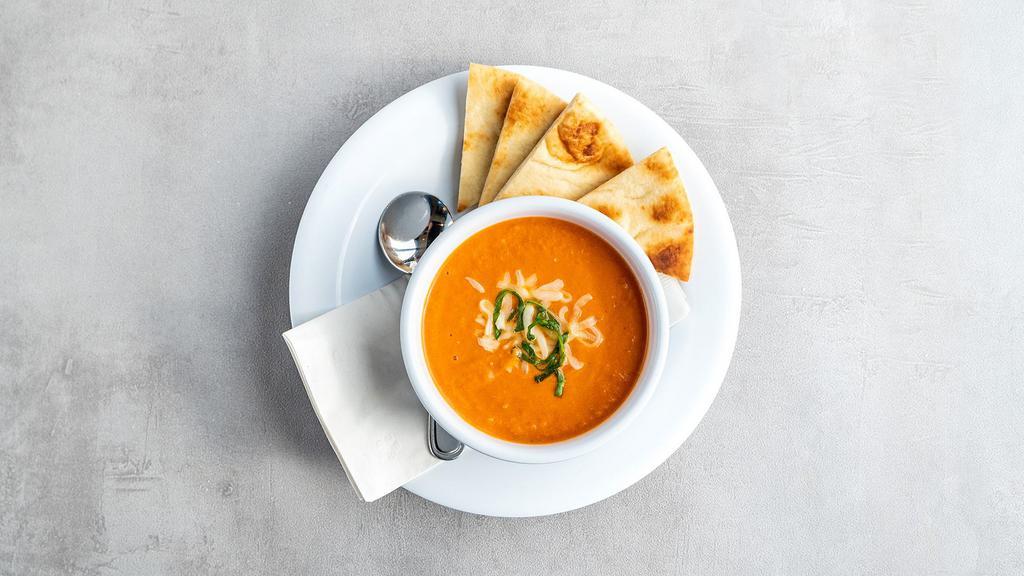 Tomato Bisque - Bowl · Tomatoes with garlic and onion. Perfect for pairing or on its own. Served with pita.