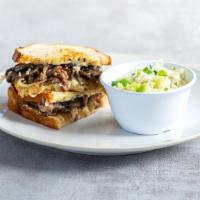 Steak Stack · Grilled steak, grilled mushrooms, mozzarella, caramelized onions, feta-parsley spread, and t...