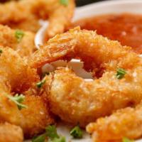 Fried Shrimp · Flour dusted with chef special spices then deep fried crispy golden brown.