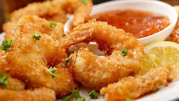 Fried Shrimp · Flour dusted with chef special spices then deep fried crispy golden brown.