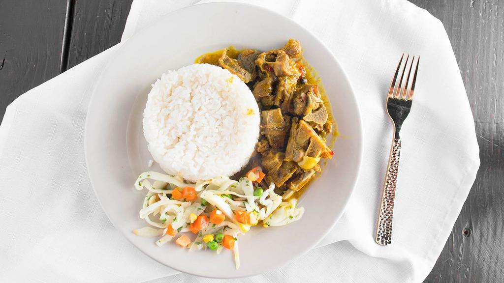 Curry Goat · Marinated in our house made curry spice blend stew low and show to tender perfection. our curry goat is to die for