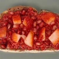 Nutella Berry Toast · Raspberry spread served over Nutella. Topped with fresh, diced strawberry