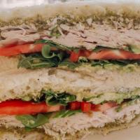 California Turkey Sandwich · Turkey, arugula, pesto, avocado, tomato and everything bagel seasoning. Served on Salt City ...