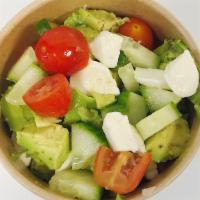 Avocado Salad · Avocado, mozzarella cheese, tomato, cucumber dressed in olive oil and garlic salt.