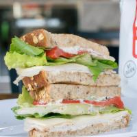 Turkey Breast Sandwich · Turkey, provolone cheese, lettuce, tomato, and roasted peppers on multigrain bread