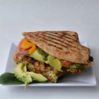 Veggie Pesto Panini · Avocado, tomato, onions, peppers, provolone cheese and pesto in a grilled panini.