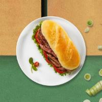 Reuben Sandwich · Unreal corned beef, (V) VoiLife Provolone, sauerkraut, pickles, and vegan Thousand Island dr...