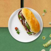 Ole Chipotle Beef And Cheddar Sandwich · Unreal corned beef, (V) VoiLife Cheddar, sauteed onions, sauteed green peppers, vegan chipot...