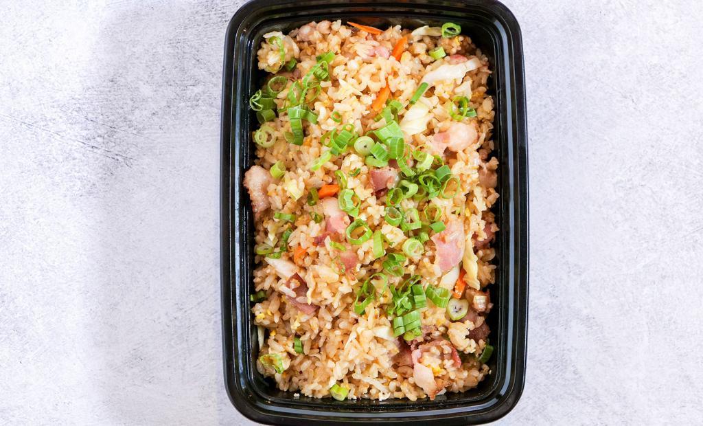 Vegetable Stir Fried Rice · Cabbage, onion, carrot, green onion fried rice. Comes with salad and miso soup.