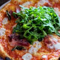 Arugula & Prosciutto Pizza · San Marzano tomatoes, fresh mozzarella, parmesan, prosciutto, arugula and lemon