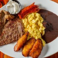 Desayuno Guate · Huevos revueltos con frijol colado, platano, crema, tortillas, chorizo y Carne azada / Scram...