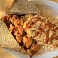 Hot & Healthy Scramble · Egg whites, chipotle chicken, pepper jack, roasted red peppers, sriracha drizzle.