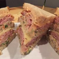 Sloppy Joe · Triple decker served on rye pick any two meats ham, turkey, or roast beef, coleslaw, Swiss a...