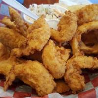 Fried Fish & Onion Rings With Mild Hot Sauce · Hot N' Fresh Fried Fish in crispy batter, served on a bed of onion rings. Served with Mild h...