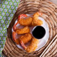 Fried Shrimp With Hot Sauce · A generous portion of Hot N' Fresh Fried Shrimp, served on a bed of golden delicious fries. ...