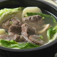 Nilagang Baka (Beef Soup) · Tender beef shanks and ribs in a flavorful soup, with greens, potatoes, and peppercorn. A be...