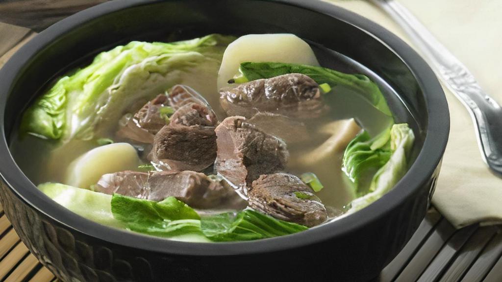 Nilagang Baka (Beef Soup) · Tender beef shanks and ribs in a flavorful soup, with greens, potatoes, and peppercorn. A best seller.
