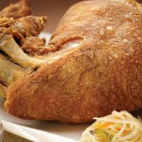 Crispy Pata (Crispy Pork Hock) · Premium pork hock simmered in a special marinade and deep fried to perfection. Served with s...