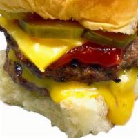 Double Cheeseburger · Double beef & cheese, ketchup & pickle.