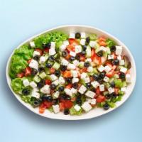 Green Greek Salad · Fresh Lettuce, cucumber, tomatoes, onions, olives, and feta cheese tossed with our house dre...