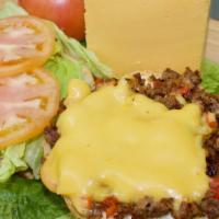 Chopped Cheese · Ground beef, melted American cheese, lettuce, tomato and mayo.