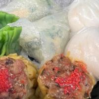 Dim Sum Platter (8) 双喜临门点心拼盘 · 2 PCS each of crystal shrimp dumplings, Shumai ,  Scallop w. pea sprout dumplings, Blue crab...