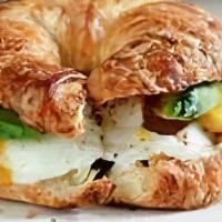 Avocado, Egg & Cheese · A buttery croissant with avocado, two eggs and choice cheese.