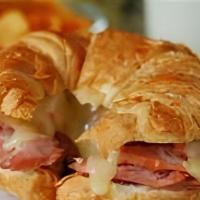 Ham, Egg & Cheese Sandwich · A buttery croissant with sliced ham, two eggs and choice of cheese.