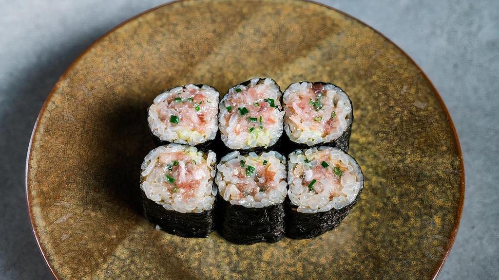 Negitoro Maki · Fatty bluefin tuna tartare, sesame seeds, rakkyo, and chives.